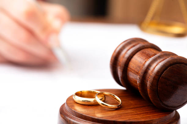 istock Signing decree of divorce with gavel 2186390034