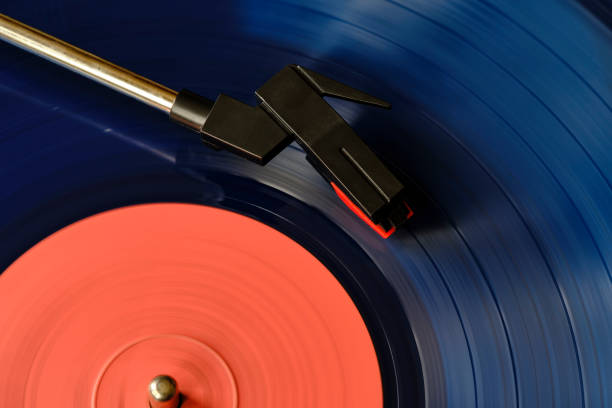 istock Blue vinyl record and needle for playing music from vinyl top view. 2186403001