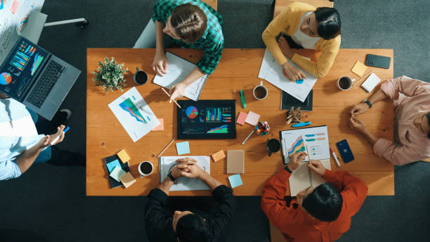 istock Top view of smart business man standing while writing at board. Convocation. 2186405180