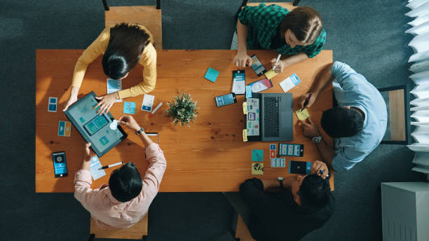 istock Top view of developer and designer shake hand together at meeting. Convocation. 2186405391
