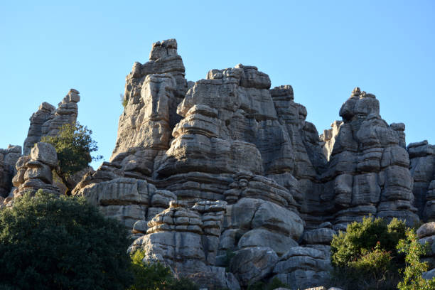 Tornillo Karst rock formations at El Torcal de Antequera, a nature reserve in the Sierra del Torcal mountain range located south of the city of Antequera, in the province of Málaga, Andalusia, Spain. It is known for its unusual landforms and is regarded as one of the most impressive karst landscapes in Europe.