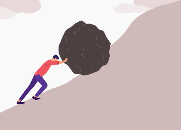 istock Businessman Pushing A Large Rock Up To The Hill. 2186416473