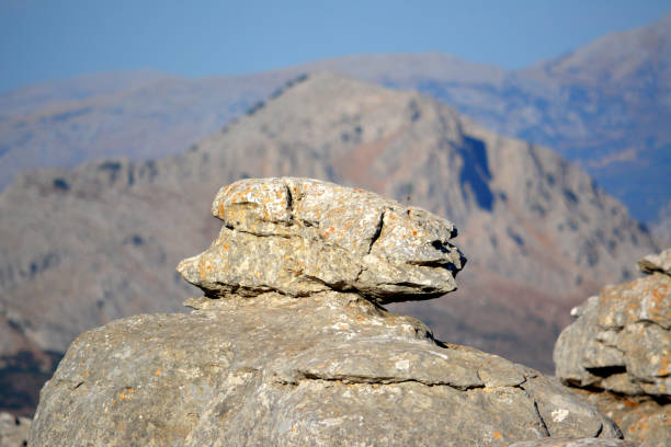 Rock formation at El Torcal de Antequera, a nature reserve in the Sierra del Torcal mountain range located south of the city of Antequera, in the province of Málaga, Andalusia, Spain. It is known for its unusual landforms and is regarded as one of the most impressive karst landscapes in Europe.