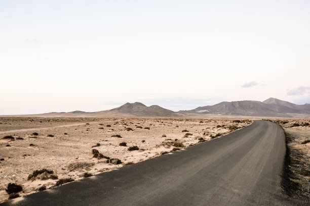 istock Countryside Desert Dirt Road 2186420643