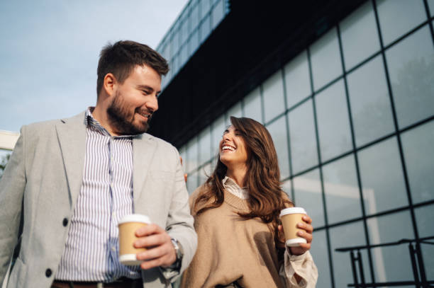 istock Business partners walking and talking during coffee break 2186421208