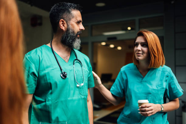 istock A nurse comforts a doctor during a break outside the hospital scene 2186421749