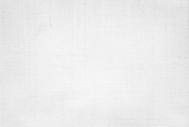 istock White color fabric canvas woven texture background in pattern light blank. Natural gauze linen, carpet wool and cotton cloth textile textured as clean empty for decoration text. Grey sack material. 2186422923