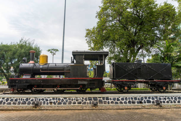 istock Vintage Locomotive Displayed in Scenic Outdoor Setting 2186424712