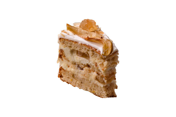 Piece of homemade creamy cake with different cocoa and vanilla fillings, with a soft crust, decorated with white whipped cream. Extremely close up