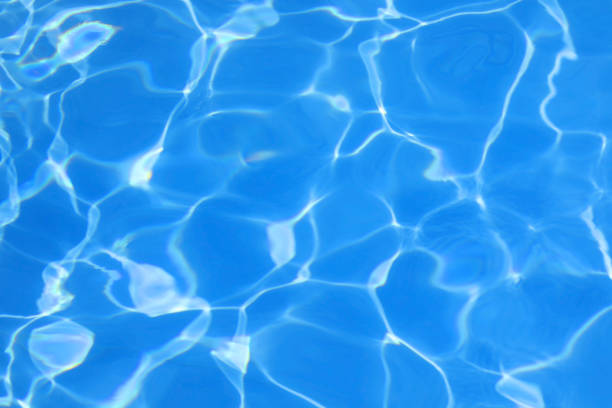 istock blue background of water with light reflections without people 2186432499