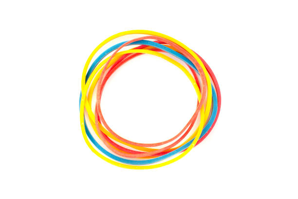 istock Multicolored rubber bands on a white background, top view. Rubber band, multicolor rubber bands on a white background, top view. A bunch of multi-colored rubber bands on a white background, close-up. 2186433153