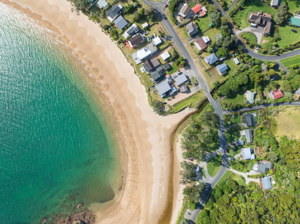 istock Coastal Suburb overhead perspective roof tops. 2186437600
