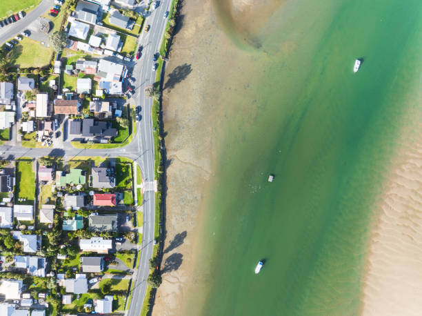 istock Residential suburbs surrounded by sunny sea harbor. 2186437601
