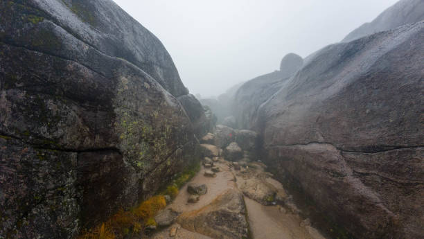 istock Foggy Rocky Landscape with Narrow Path 2186443432