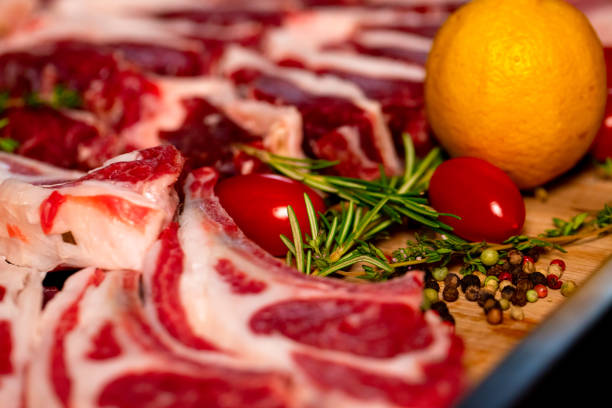 A recently skinned goat in a plastic bucket