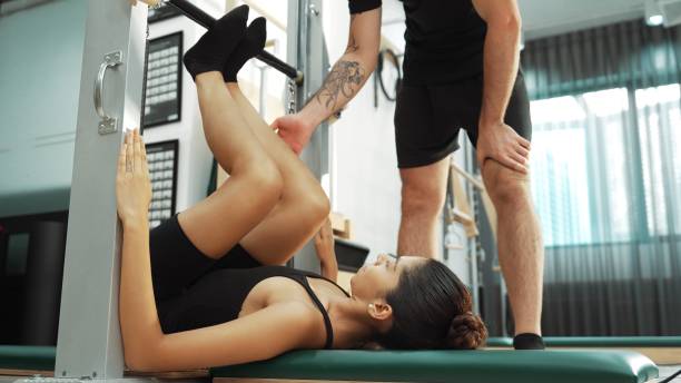 istock Happy girl doing leg spring supines series for enhancing flexibility. Habituate. 2186447196