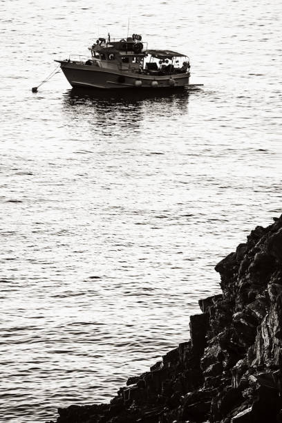 istock Small Boat Moored on a Vibrant Coastline with Graphical Effect 2186450370