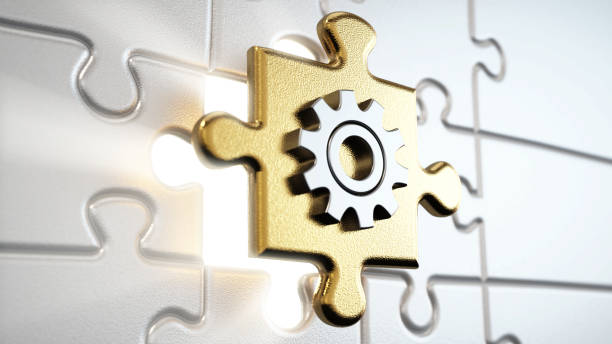 istock Jigsaw puzzle piece with gear symbolizing problem solving and innovation moves through the hole among connected puzzle parts 2186452265