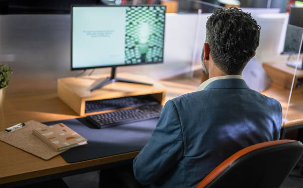 istock A Mature Business Executive Engaged in Desktop Analysis 2186452434