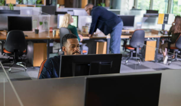 istock Mixed Race Business Professional Engaged in Office Work 2186452442