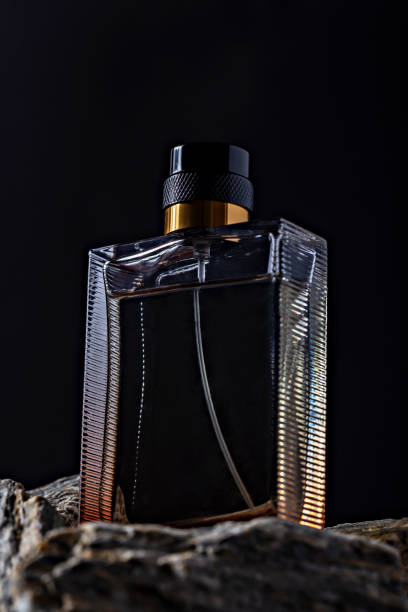 istock Elegant glass perfume bottle on rocks 2186454067