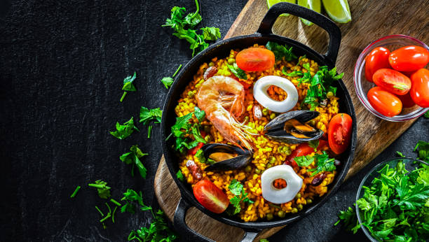 istock Seafood paella served in a cast iron pan 2186456775