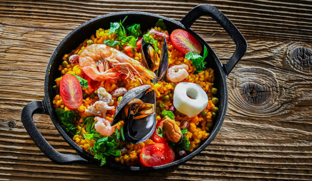 istock Seafood paella served in a cast iron pan 2186456784