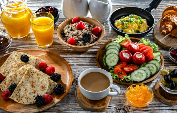 istock Breakfast served with coffee, eggs, cereals nd croissants 2186457068