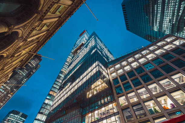 istock Illuminated office buildings in London 2186457302