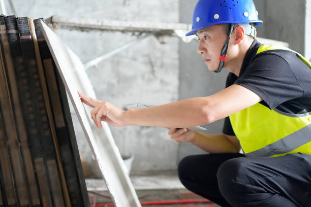 istock The supervisor is accepting the tiles 2186459476