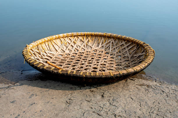The round cane boat called Coracle source of transportation since 15th century in Hampi, Karnataka