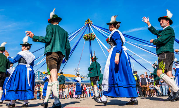 Munich, Germany - September 22: participants with tradtional clothes at the opening parade for the annual oktoberfest in munich on September 22, 2024