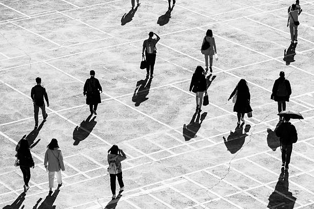 Taipei, Taiwan- November 23, 2023: Monochromatic picture, overlooking people rushing to work in Taipei City, Taiwan.