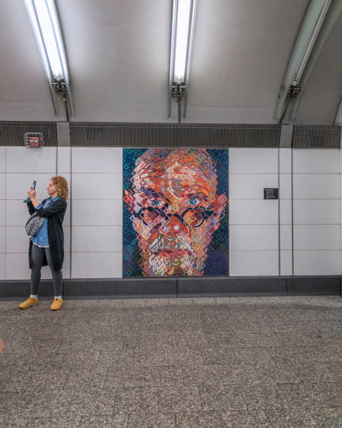 New York, New York, USA  October 30, 2024: Subway Portraits by artist Chuck Close at the 2nd avenue subway station New York, New York, USA. The large scale portraits are based on his detailed photo-based paintings.