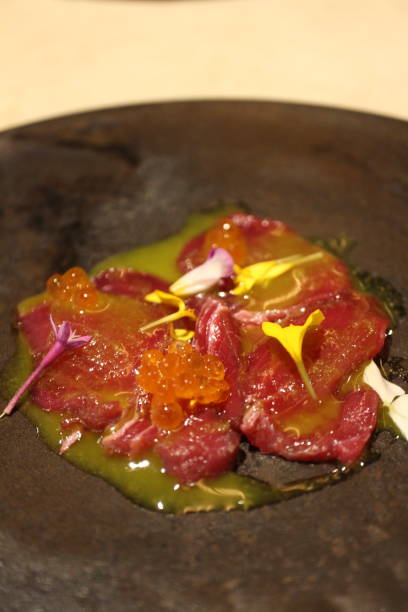 istock Italian cuisine: aged yellowfin tuna with pistachio sauce 2186480597
