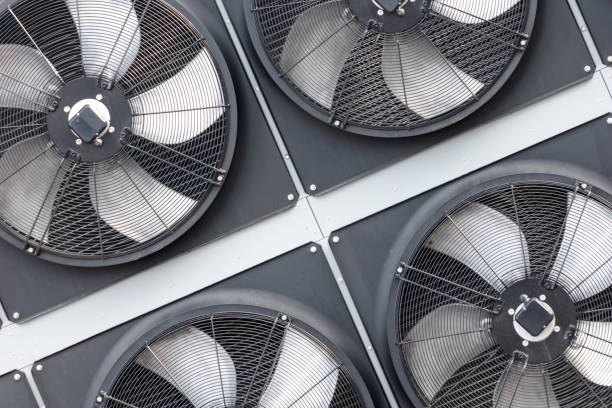istock Four fans are mounted on a wall 2186480851