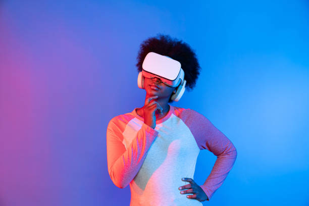 istock Profile thinking beautiful African wearing VR glasses metaverse. Contrivance. 2186495447