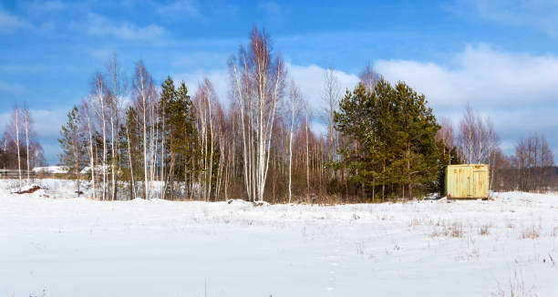 istock Beautiful winter landscape with white snow, blue sky and trees 2186499637