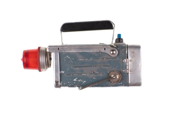 istock vintage aluminum electric flashlight and isolated on white background 2186506412
