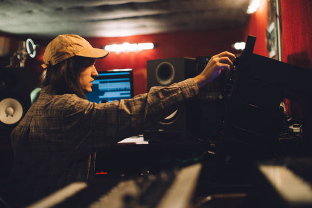istock Sound technician working on audio equipment in a recording studio 2186509052
