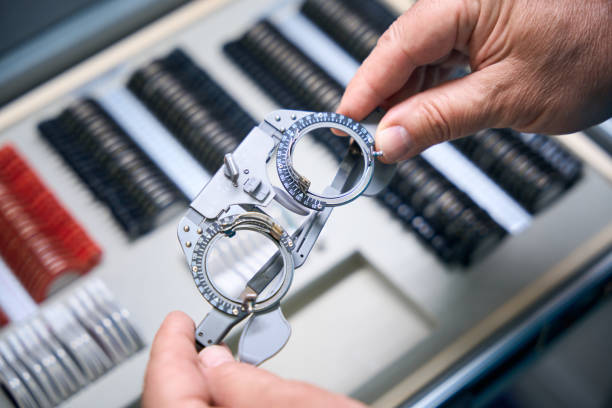 istock Optometry glasses examining. Professional oculist instruments. Close up 2186509686