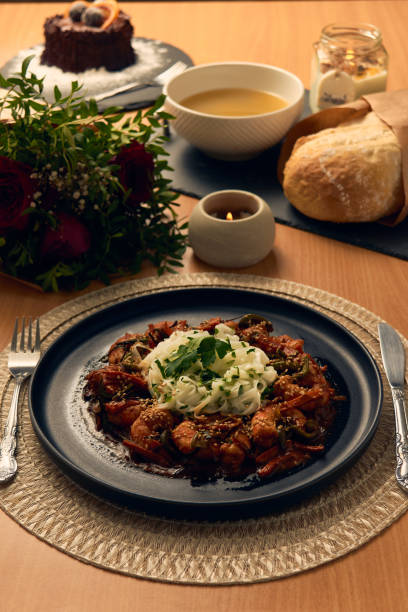 Gourmet Pasta Dinner with Shrimp and Elegant Setting