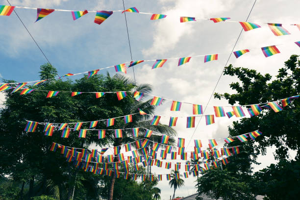 istock Vibrant rainbow flags decorate a sunny outdoor space, celebrating diversity and pride. 2186522686