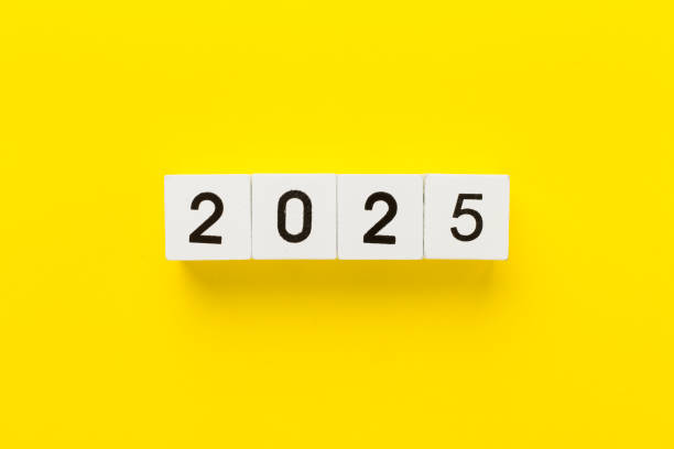 istock Cubes with 2025 on color background, top view 2186528137