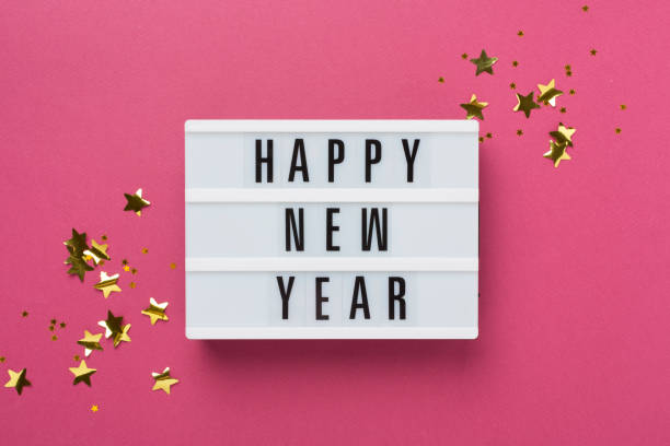 istock Happy New Year with decor on color background, top view 2186528141
