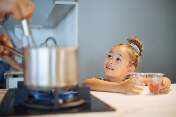 istock Cute little girl at cookie making course 2186528495