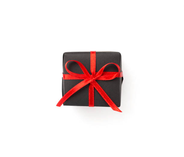 istock Black gift box isolated on white, top view. Black Friday concept 2186529520