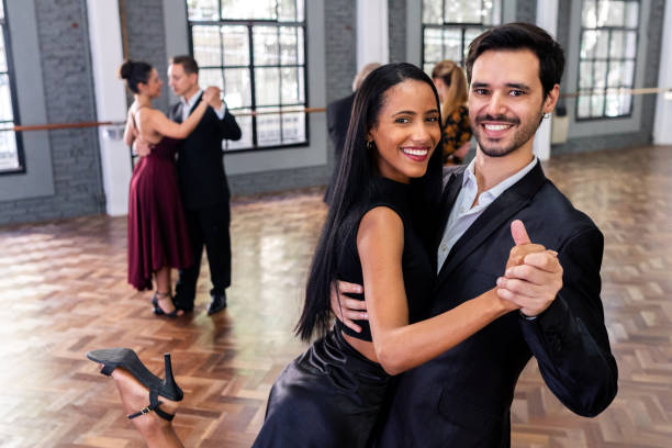 istock Portrait of a couple dancers dancing tango in a dance studio 2186541747