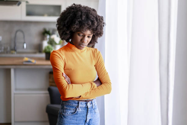 istock Afro-american woman looking sad 2186541810