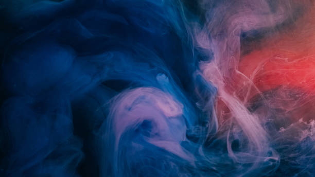 istock Burning sparkles bright flame smoking blur purple 2186542622